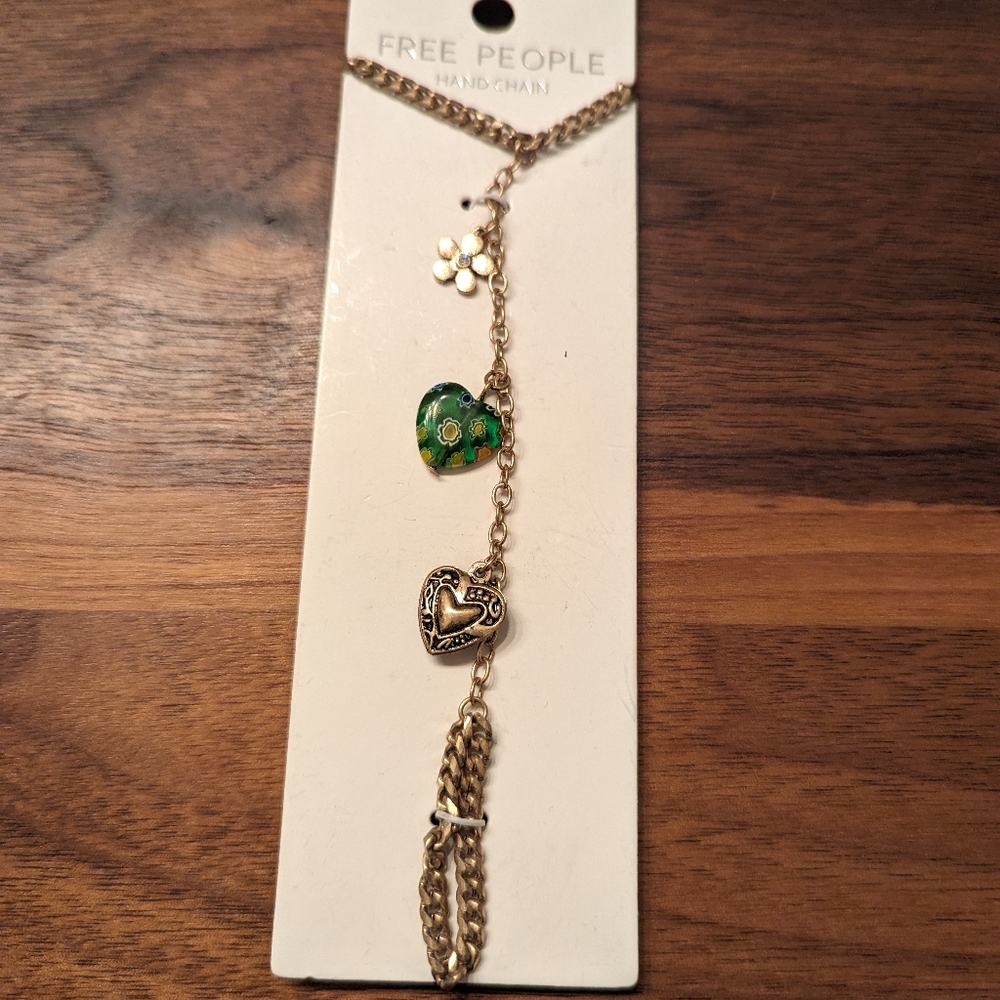 Free People Hand Chain with heart & floral charms, NWT